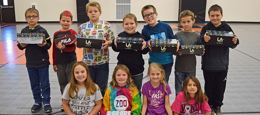 Sole Power Project gives athletic shoes to area third-graders